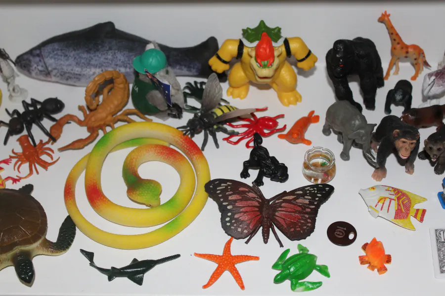 A collection of small Sandtray Therapy figures at the Centre &mdash; animals, sea creatures, a butterfly, and other miniatures.
