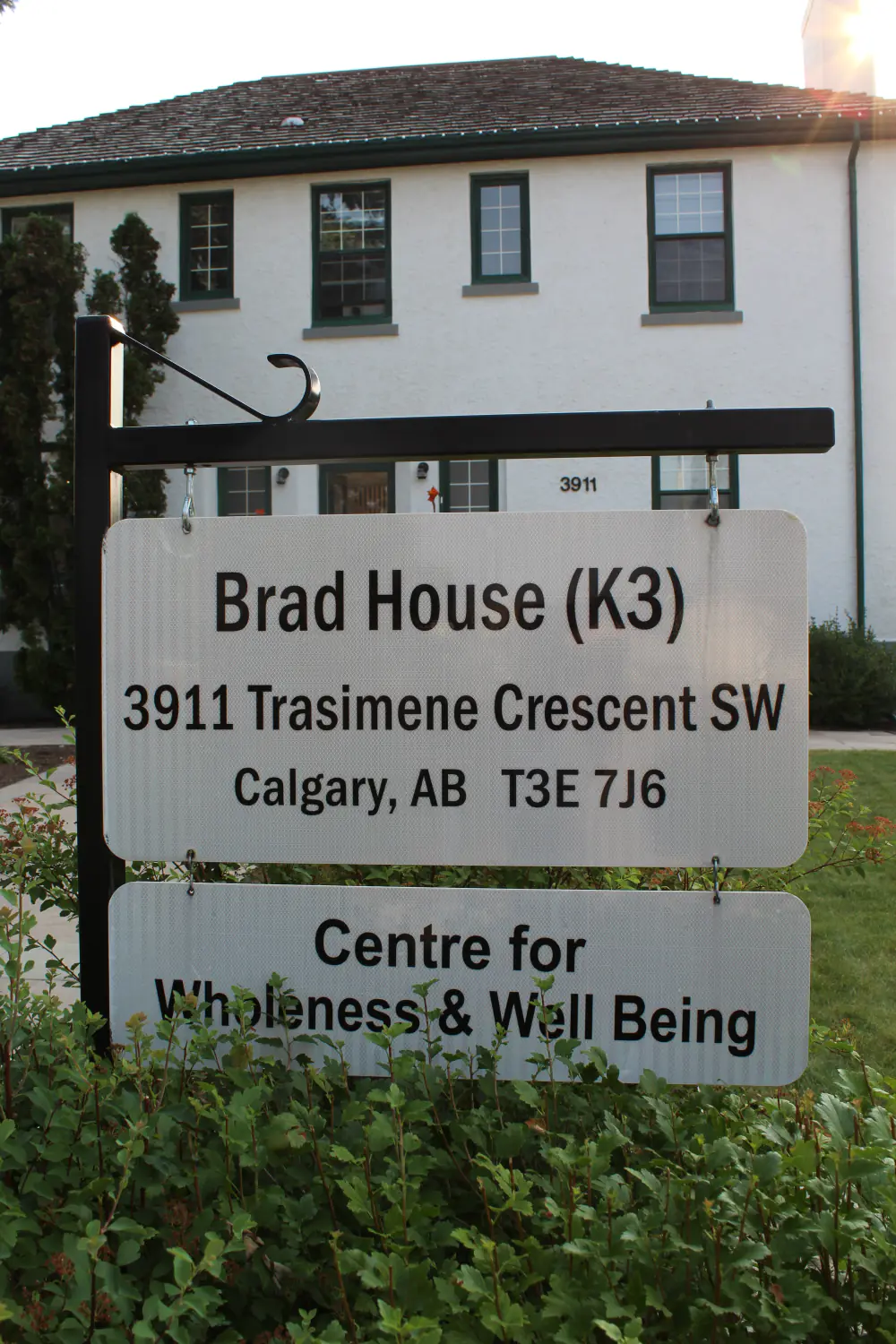 The Centre for Wholeness & Well Being sign outside Brad House (K3), 3911 Trasimene Crescent SW, Calgary.